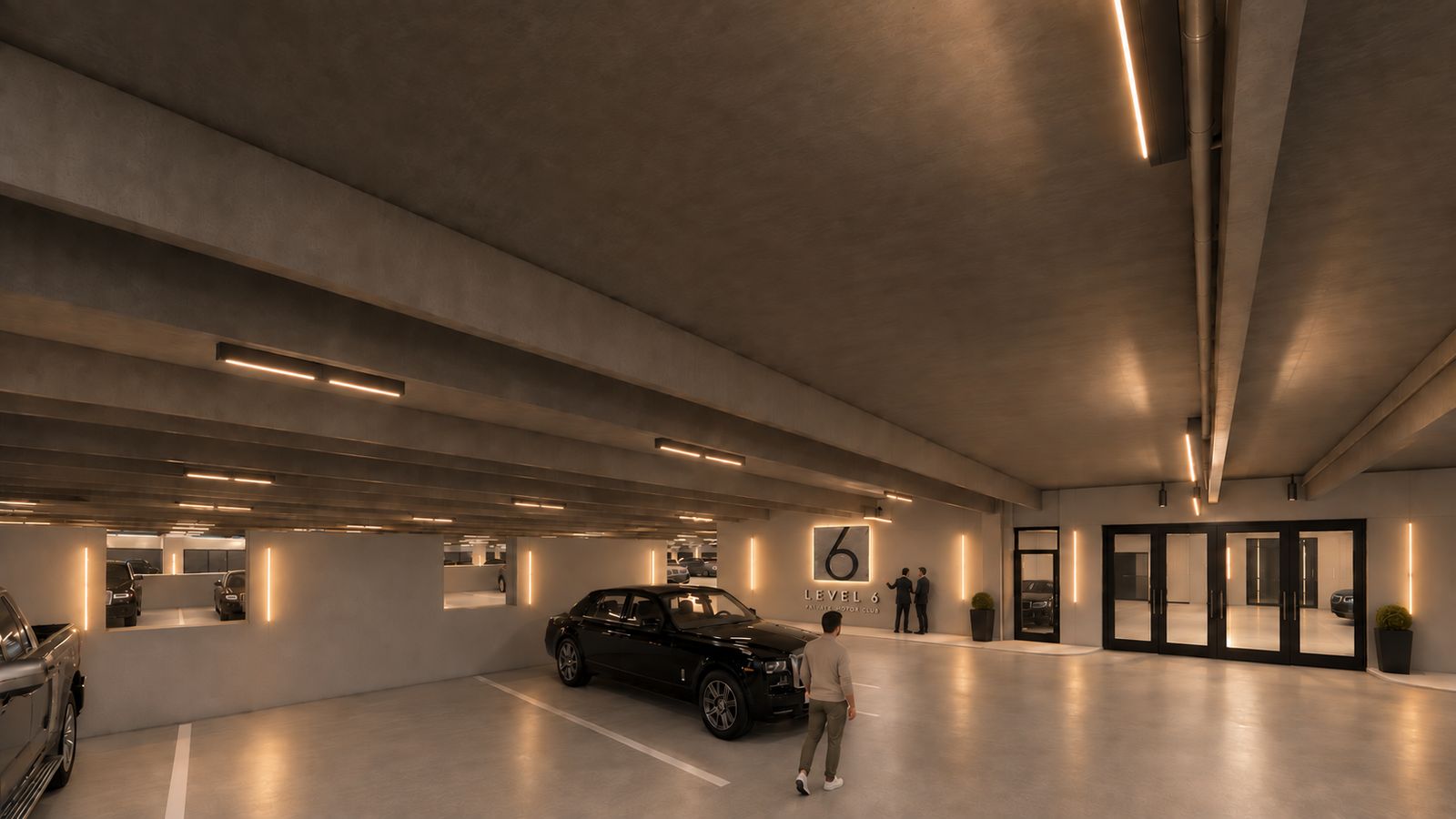 Level 6 Motor Club entry and lobby with a Rolls-Royce Phantom and backlit Level 6 signage