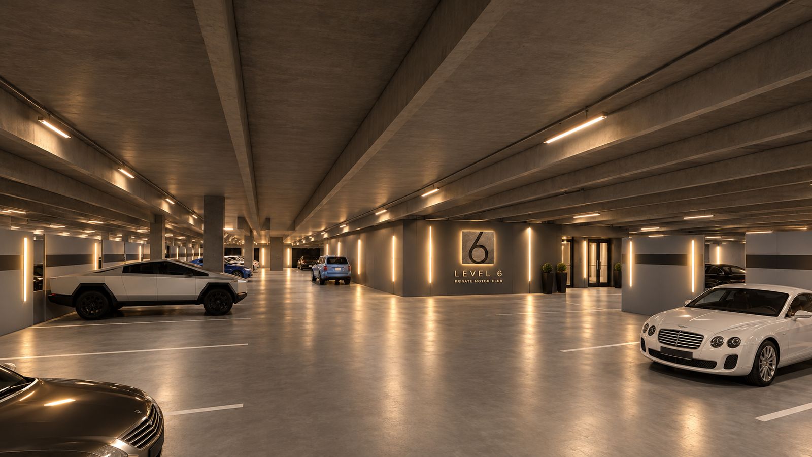 Level 6 Motor Club storage aisle with the backlit Level 6 logo wall and member vehicles